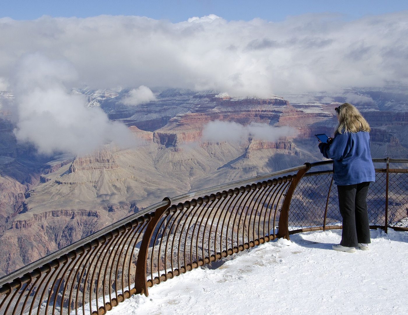The Grand Canyon seen from Mather Point under breaking storm clouds